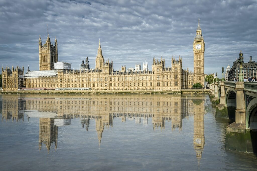 Parliament Houses, London. Scenic view of the building reflected on Thames River